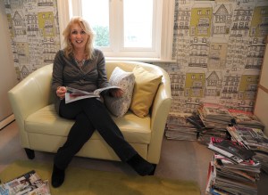 Runner Bean's usual pose-head down in a Design magazine and not a pair of trainers in sight...